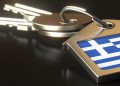 Keys and house keychain with flag of greece. national property rental or real estate market concepts.   3D rendering